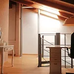 Modern Split-Level Loft With Garden Near Fondazione Prada By Rentopolis