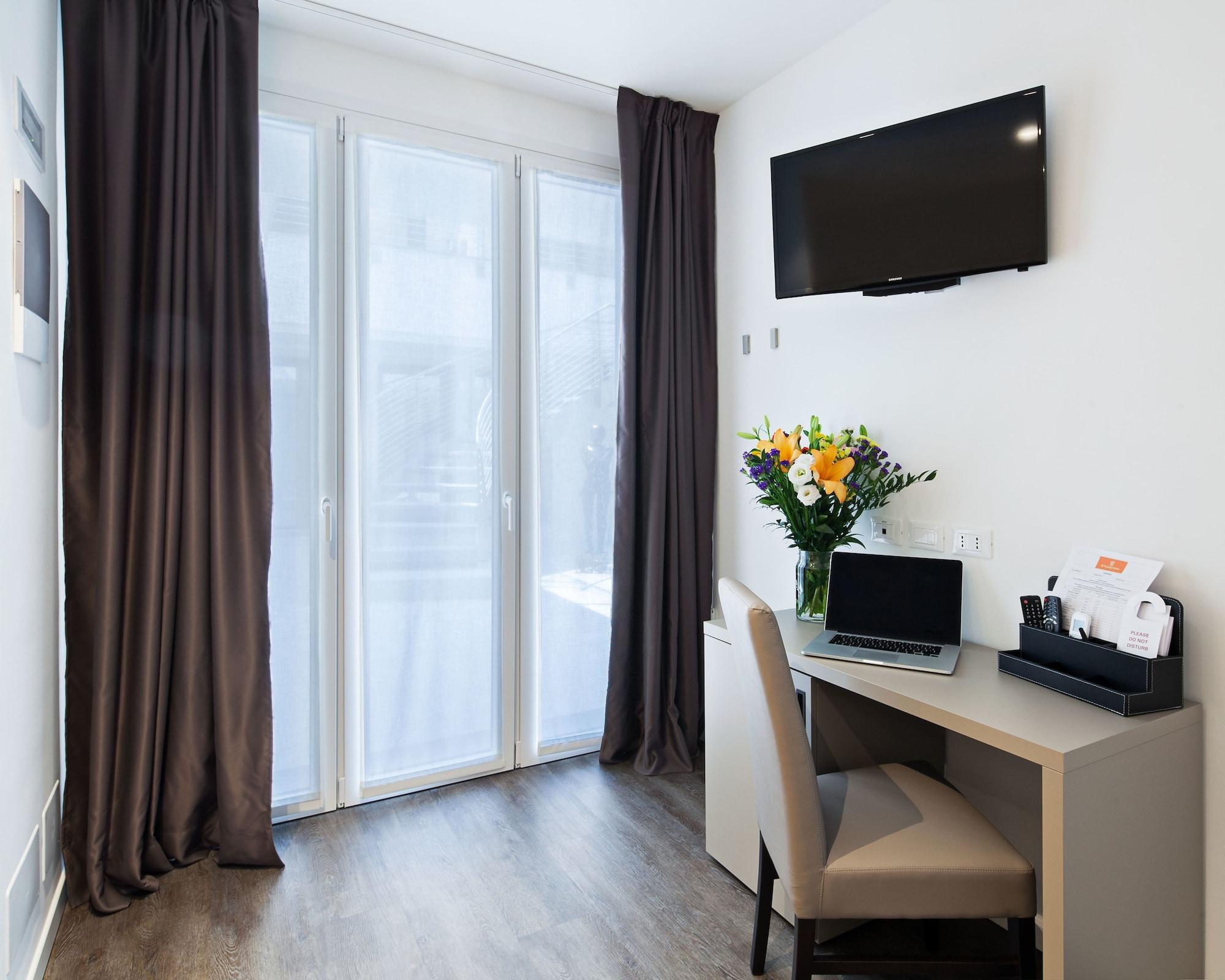 & Urban Padel Aparthotel